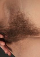 Susanna waves her hairy pussy at the camera., Susanna (iri039) ATK Natural & Hairy: Susanna (Susanna waves her hairy pussy at the camera.)